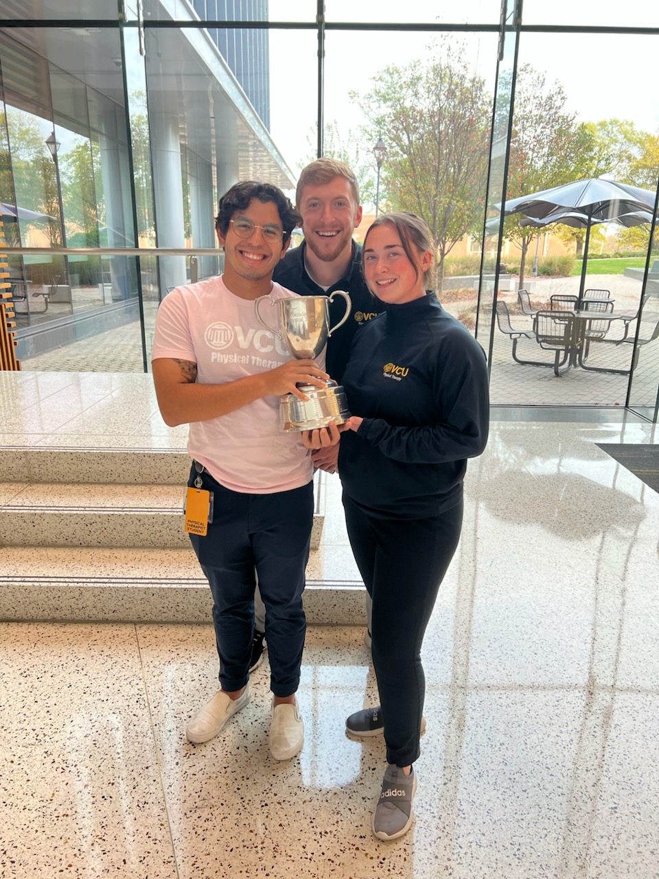 VCU Marquette Challenge winners with trophy
