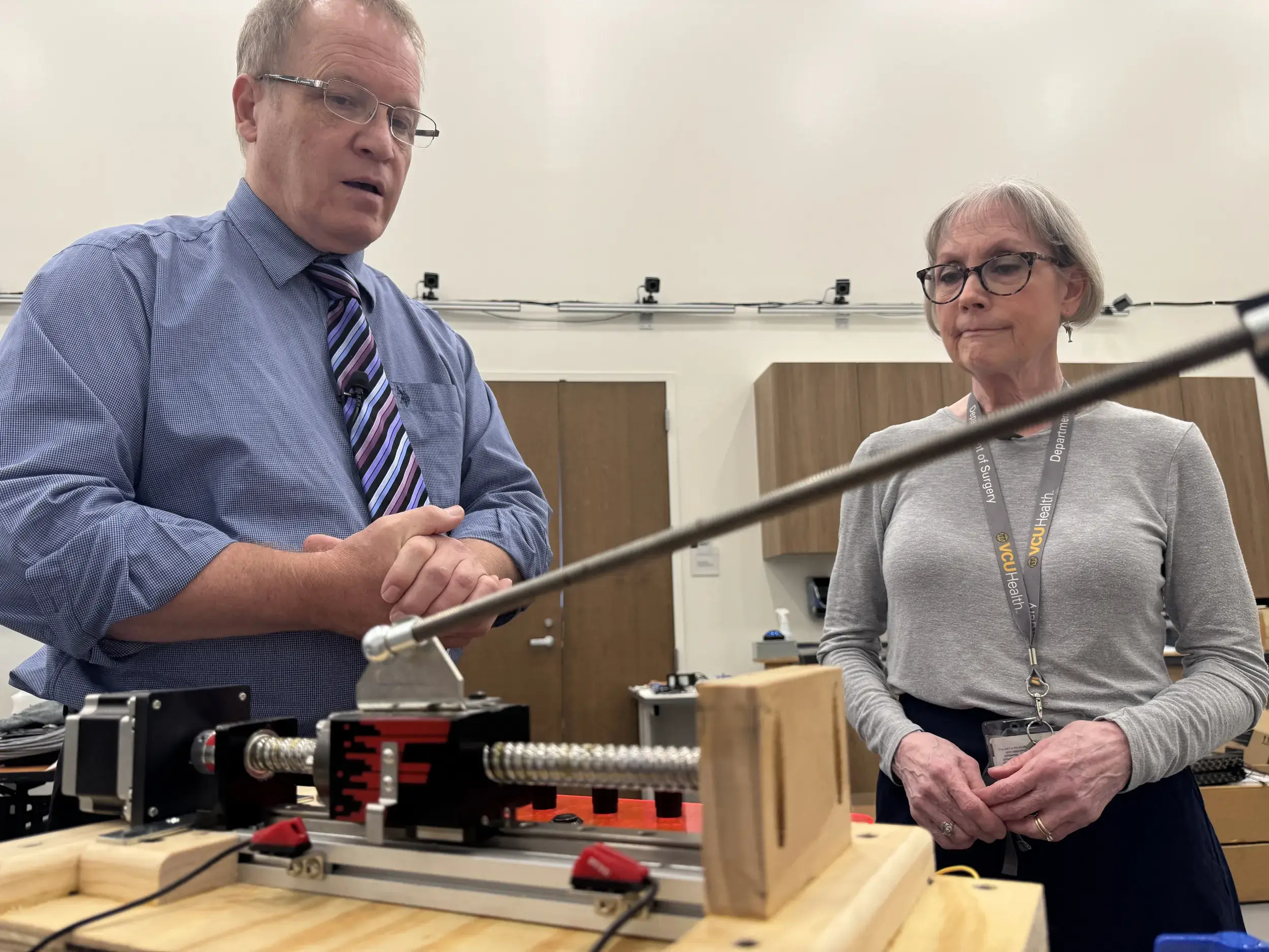 Peter Pidcoe, Ph.D., a physical therapist and biomedical engineer with appointments in the College of Health Professions, College of Engineering and the School of Medicine, works with Susan Haynes, surgical simulation administrator in the Department of Surgery. Haynes said, “Peter has helped us bring surgical practice closer to the reality of the operating room.” (Kelley & Co.)